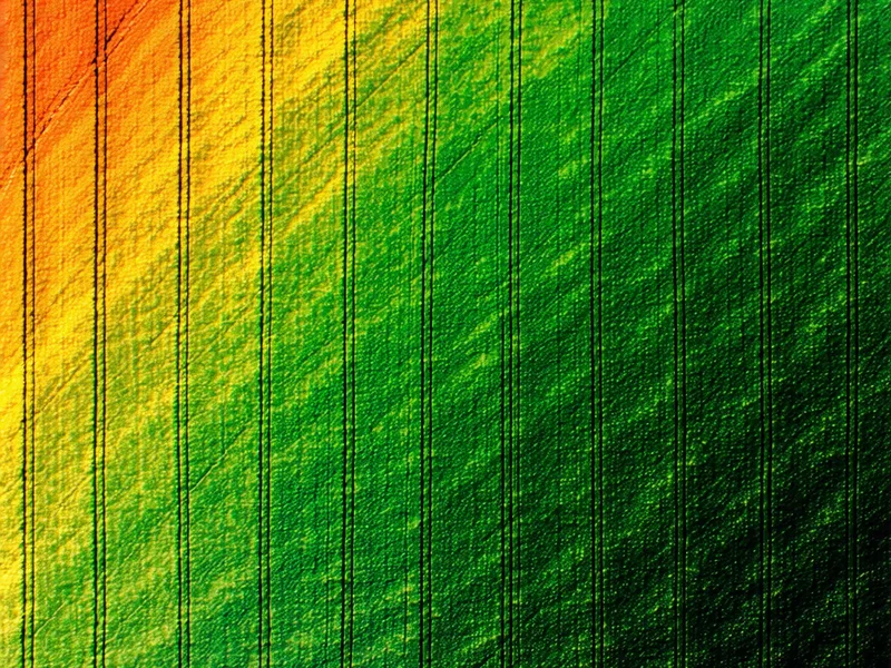 Close-up false-color multispectral band composite showing field boundary delineation with NDVI color gradient